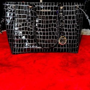 Fairly used Michael Kors Shoulder Bag.